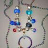 Rainbow ring and ball chain, blue & red dangles